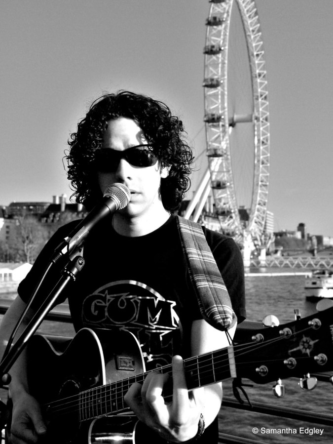 Mitch Daniels busking on the Golden Jubilee Bridge