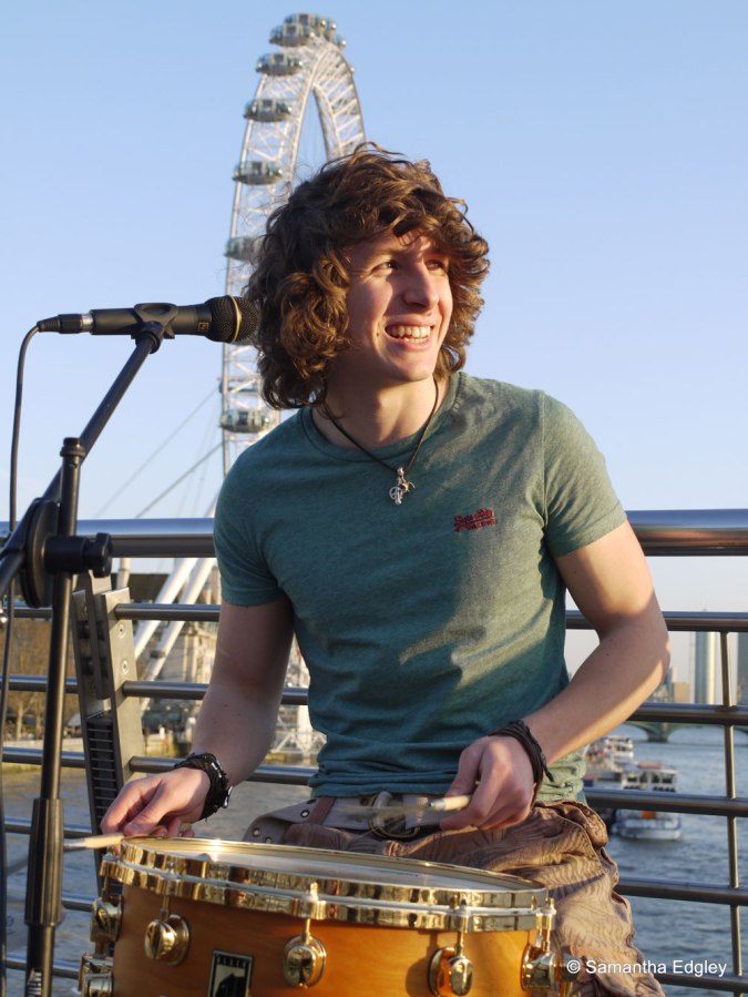 Tom Triggs busking on the Golden Jubilee Bridge