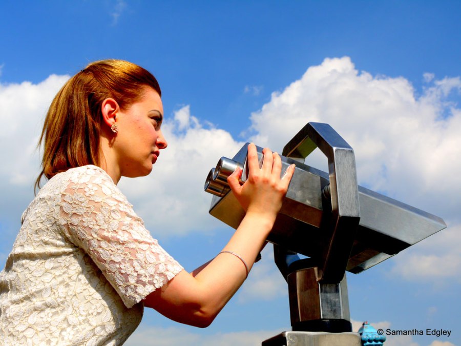 Helen looks through a view finder