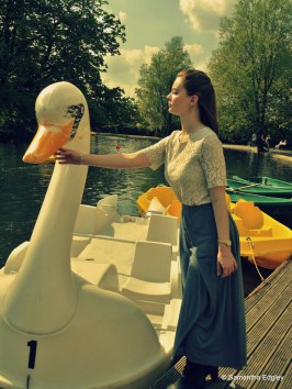 Helen standing next to the swan boat